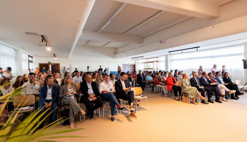 Crowd of people listening to a speech